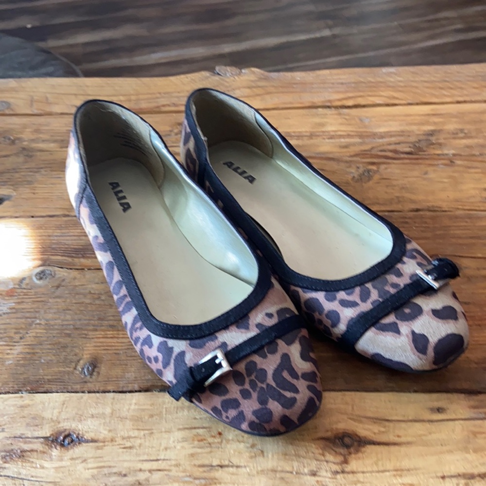 Leopard print flat shoes with very small 1/2 inch heal.